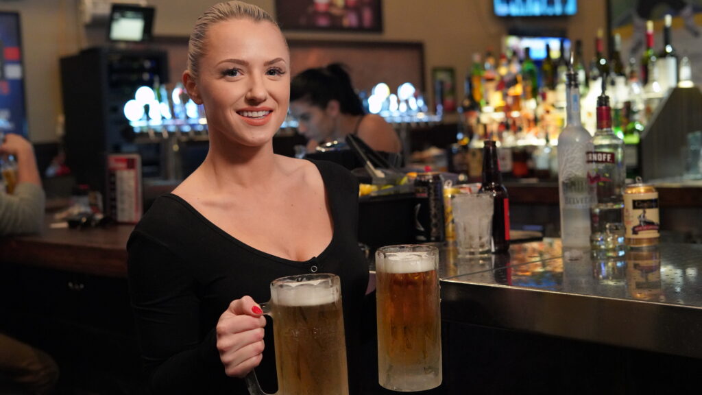 Server Holding Beer